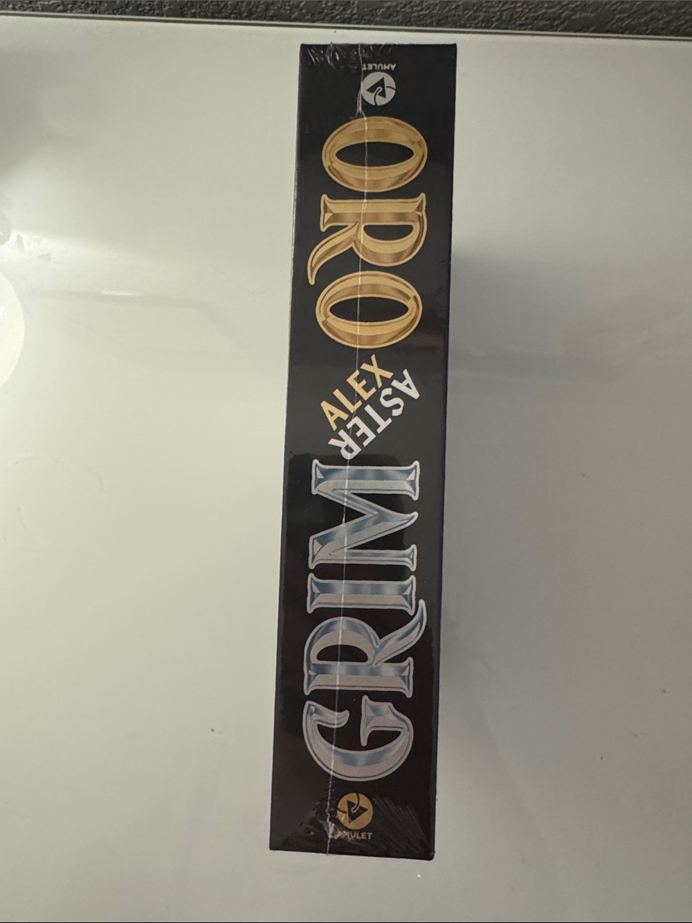 Oro and Grim by Alex Aster with sprayed edges
